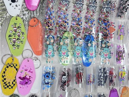 Wholesale 10 50pcs UV DTF Wrap & Cartoon Festival Style Random Pattern Keychain Stickers Hot on Sale